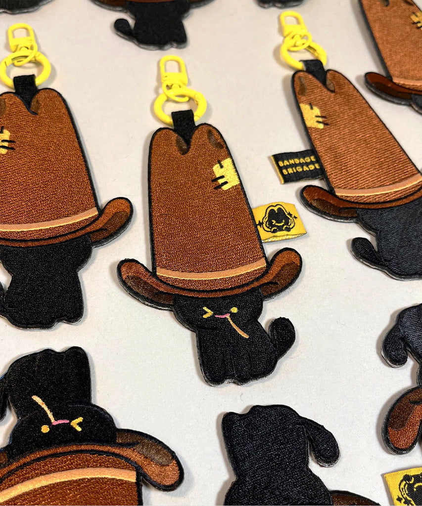 Meowdy Embroidered Key Tag – Bandage Brigade